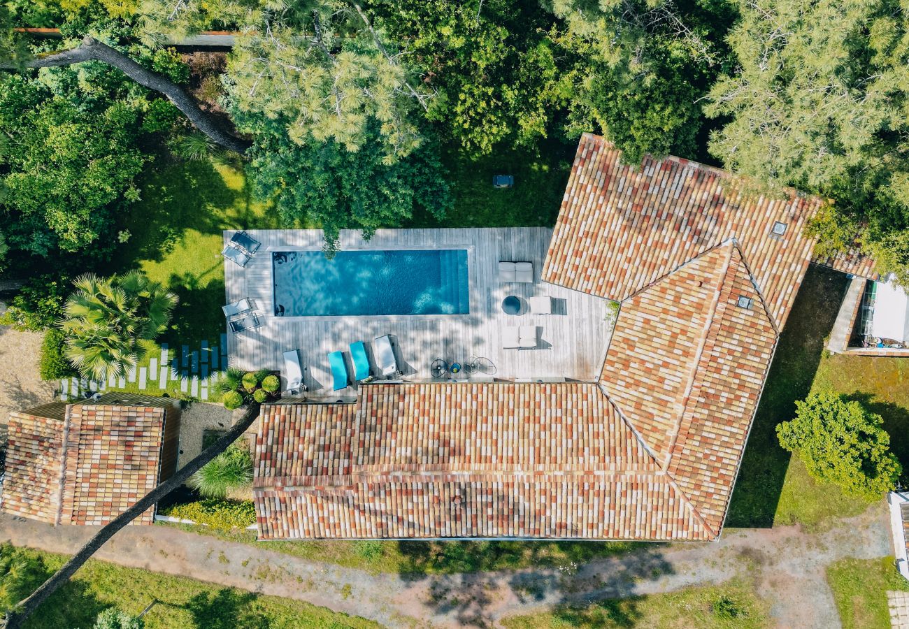 Aerial view of villa, pool and garden